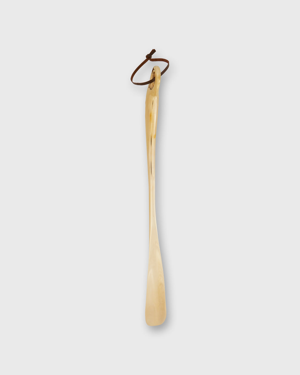 Long Curved-Grip Shoe Horn in Brass | Shop Sid Mashburn