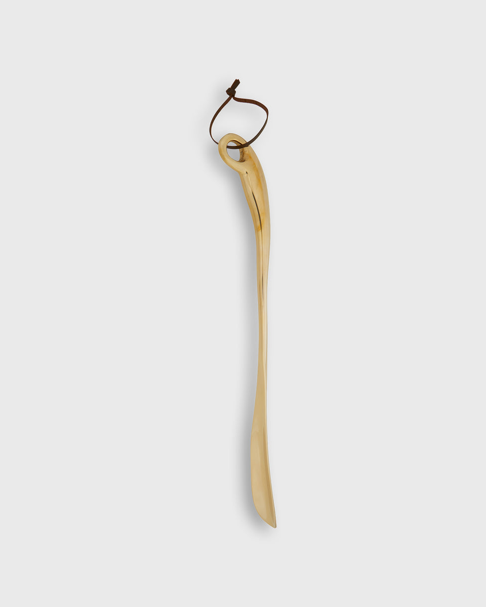 Long Curved-Grip Shoe Horn in Brass | Shop Sid Mashburn