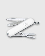 Load image into Gallery viewer, Swiss Army Knife in Falling Snow