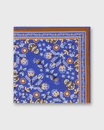 Load image into Gallery viewer, Hand-Rolled Silk/Cotton Print Pocket Square in Blue/Umber/Chalk Floral