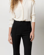 Load image into Gallery viewer, Faye Flare Cropped Pant in Black Waffle Crepe
