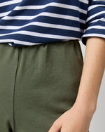 Load image into Gallery viewer, Faye Flare Cropped Pant in Olive Garment-Dyed Stretch Twill
