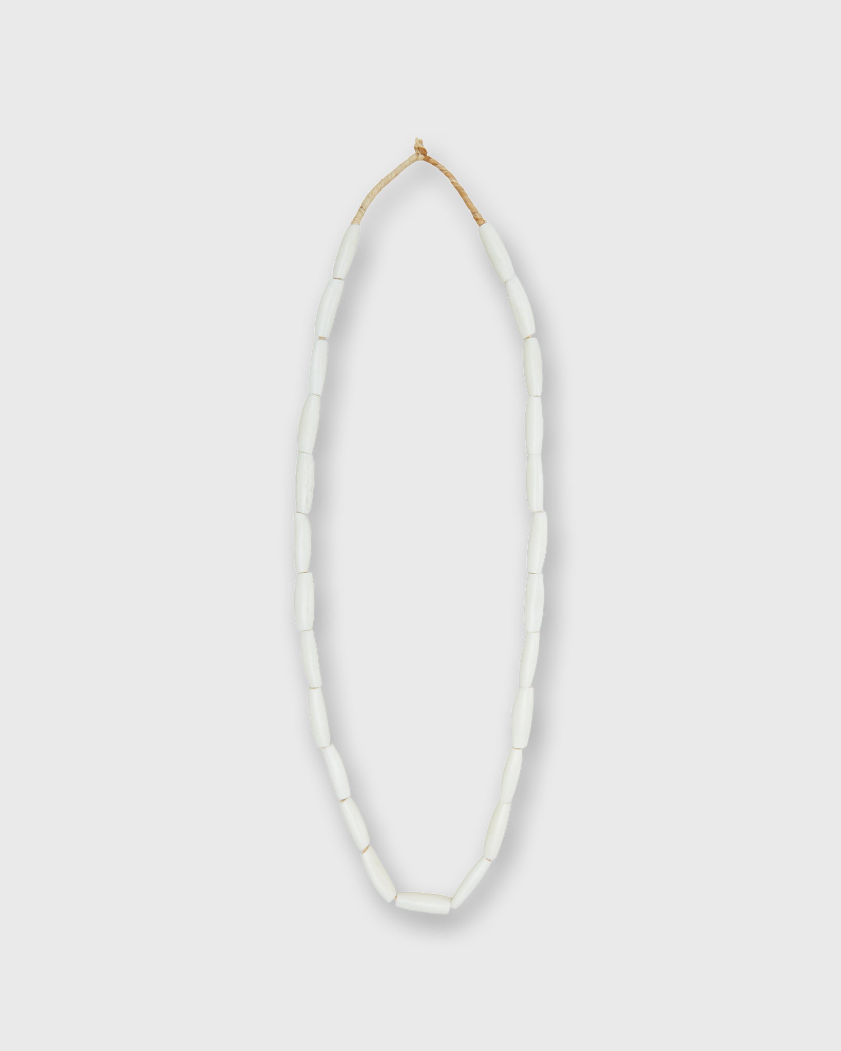 Small Elongated Cowbone Beads in Ivory