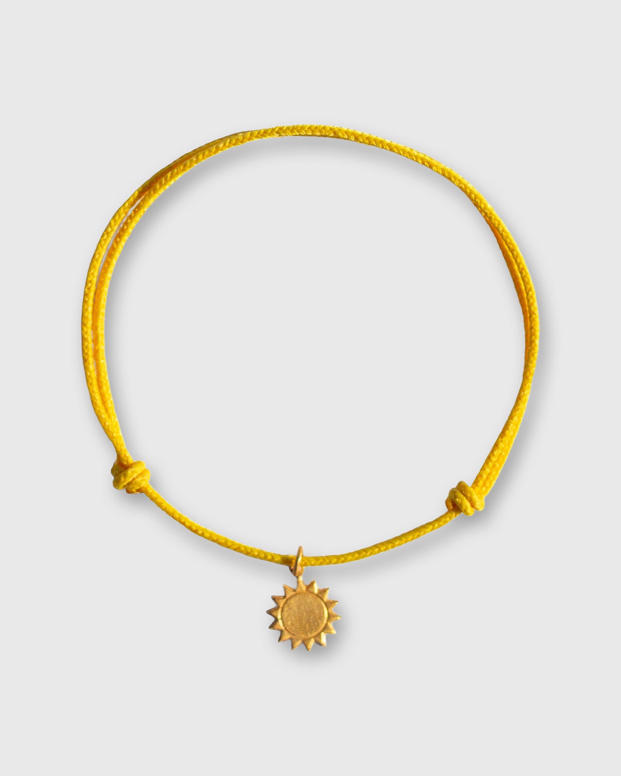 Small Sun Charm Bracelet in Gold/Assorted Color Cord