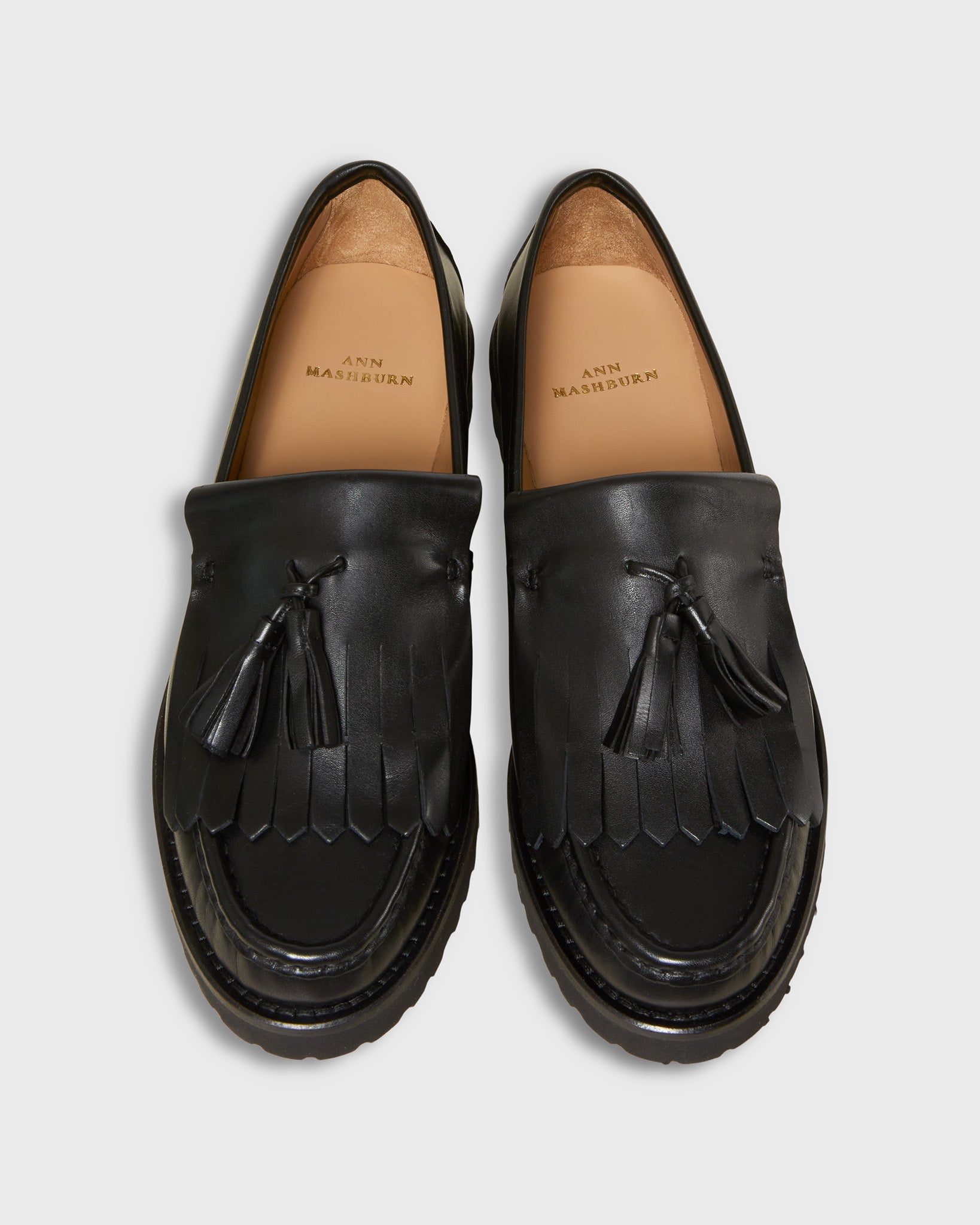 Kilt Penny Loafer in Black Leather