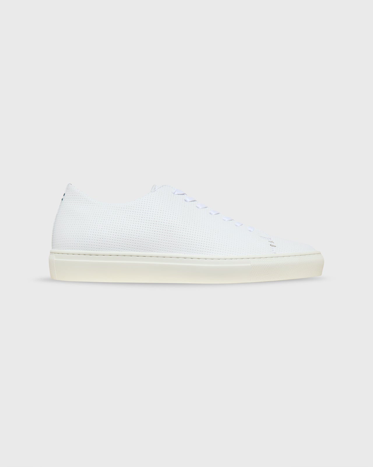 Low-Top Lace-Up Sneaker in White Perforated Leather