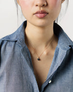 Load image into Gallery viewer, Tiny Ceramic Egg Pendant Necklace in Soot/Gold
