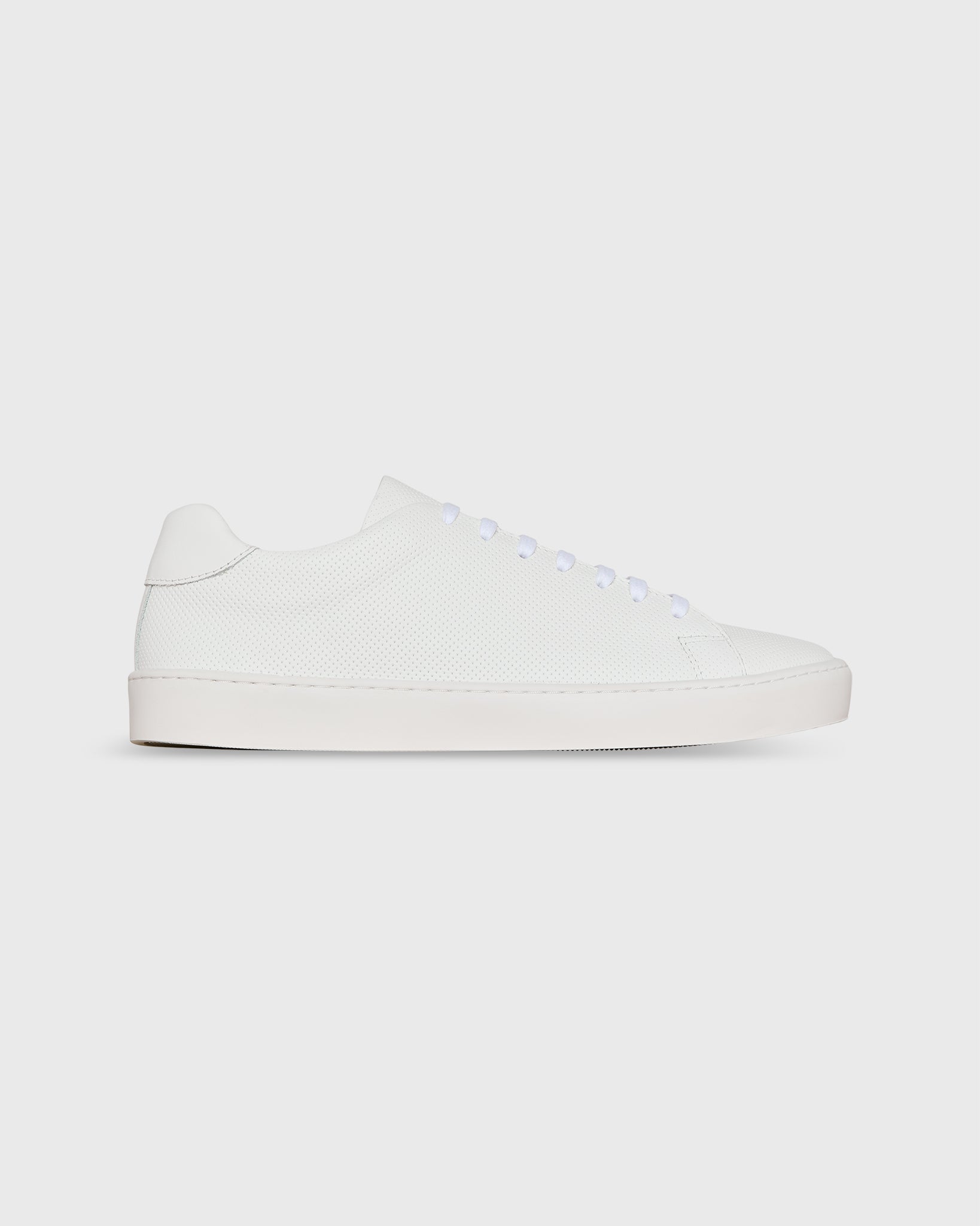 Low-Top Lace-Up Sneaker in White Perforated Leather | Shop Sid