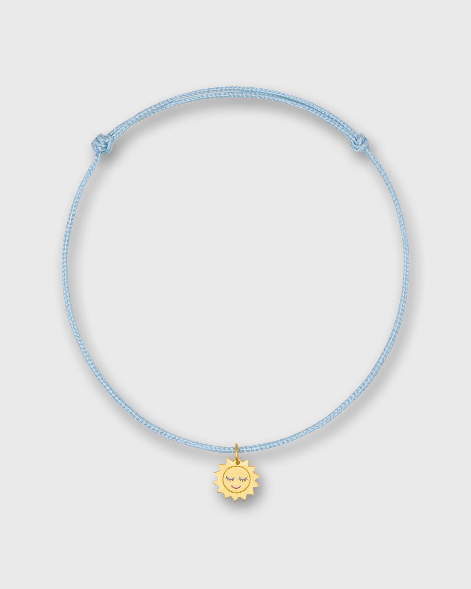 Sleeping Sun Charm Bracelet in Gold/Assorted Color Cord | Shop Ann