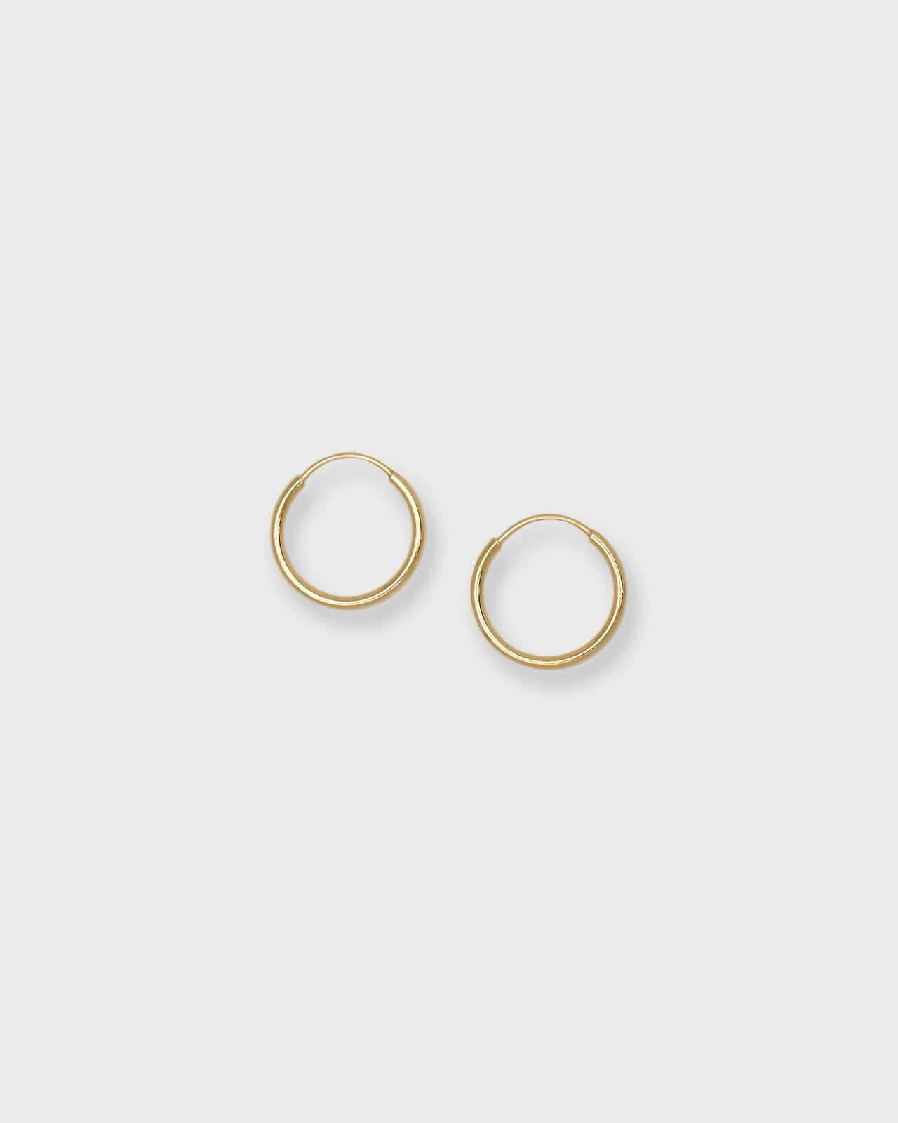 Tiny Sleeper Hoop Earrings in Gold