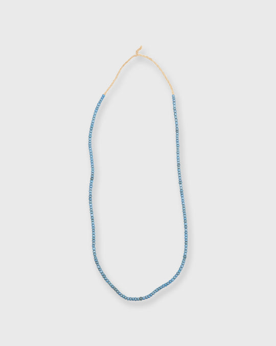 Tiny African Beads in Ocean